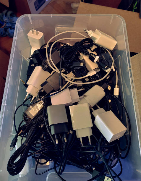 istock A plastic box filled with mobile chargers and cables 2173175785