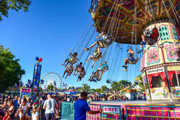 An exciting chair swing ride at a carnival. \n\n[url=file_closeup.php?id=7014560][img]file_thumbview_approve.php?size=1&id=7014560[/img][/url] [url=file_closeup.php?id=11173209][img]file_thumbview_approve.php?size=1&id=11173209[/img][/url] [url=file_closeup.php?id=10641052][img]file_thumbview_approve.php?size=1&id=10641052[/img][/url] [url=file_closeup.php?id=6923806][img]file_thumbview_approve.php?size=1&id=6923806[/img][/url]