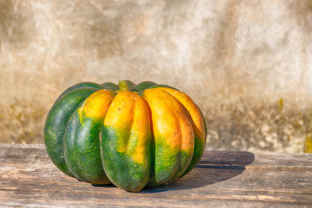 Pumpkin on an old wooden table