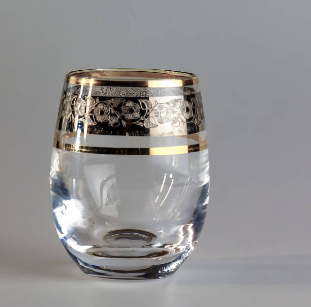 istock Empty glass Bohemia inlaid with gold on a white background 2173188426