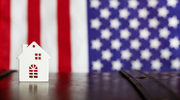 istock House shape and flag, US citizenship, immigration background 2173193340