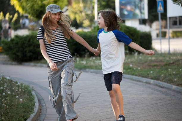 istock Mother and son bonding and having fun in a city park 2173200421