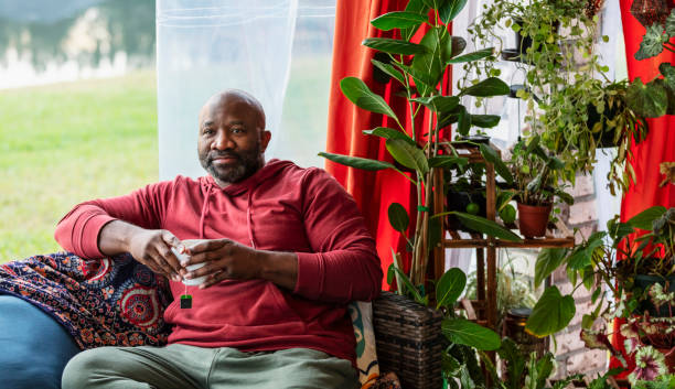 istock Mature multiracial man relaxing at home, drinking tea 2173201524