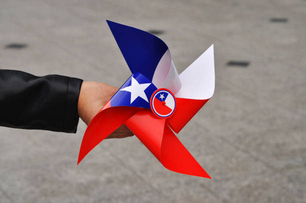 istock Hand holding beautiful swirl with chilean flag 2173203404