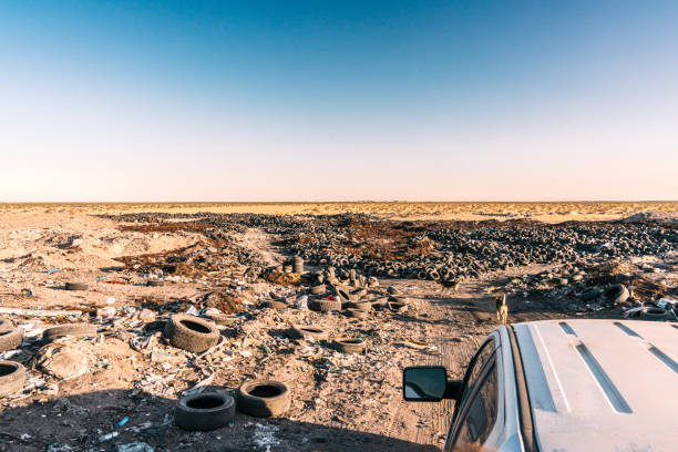 Garbage Dump, Basurero Municipal, in San Luis, Sonora Mexico with Worn-Out Vehicle Tires at Sunset