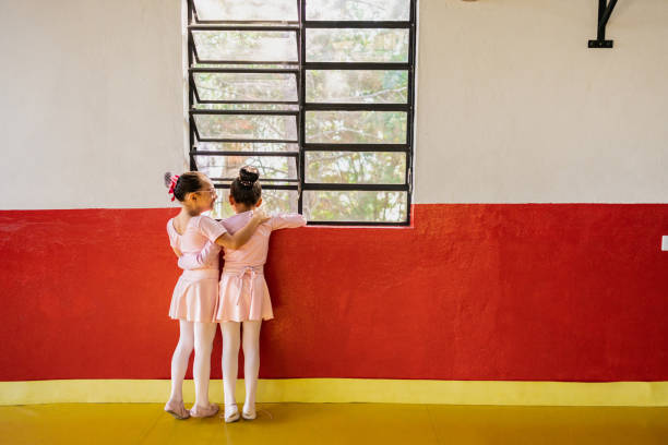 Children girls talking at ballet studio