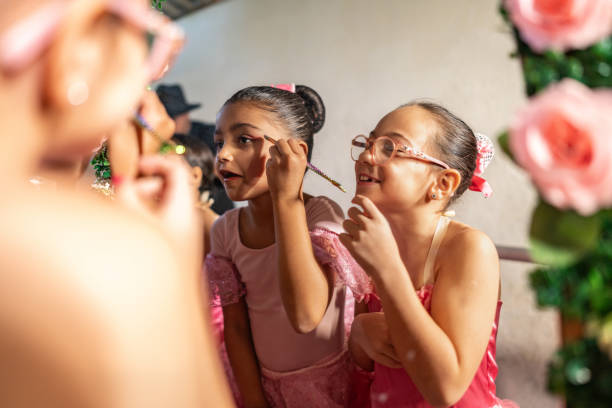 Children girls doing make up at backstage