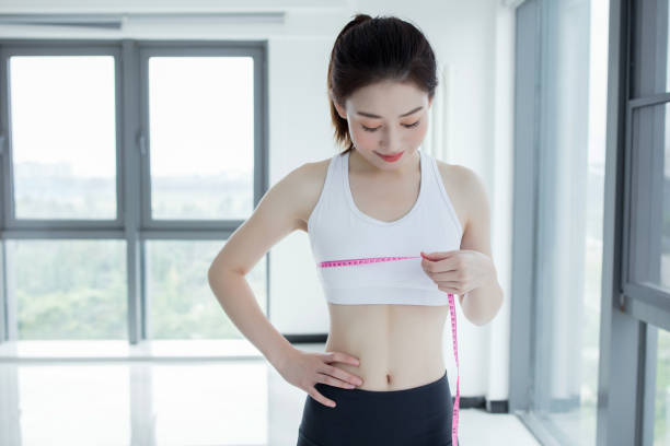 istock A woman measuring her bust 2173224418