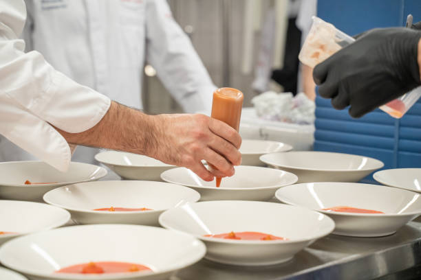 istock Chef puts final touches on meal in luxury restaurant 2173231217