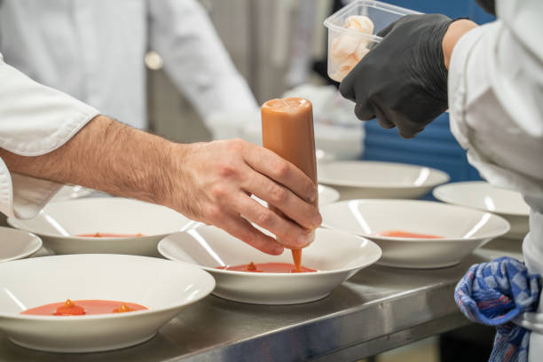 istock Chef puts final touches on meal in luxury restaurant 2173231218