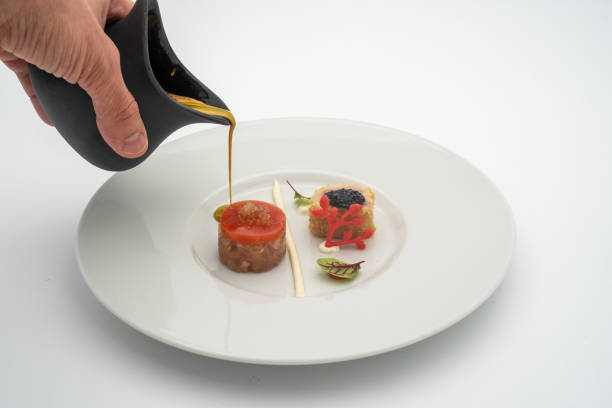istock Chef puts final touches on meal in luxury restaurant 2173232067