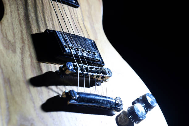 The stage is set for an unforgettable performance. A collection of musical instruments, including guitars, drums, and microphones, are neatly arranged and ready for the concert to begin.