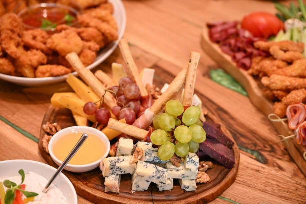 istock Plate with grapes, smoked meat and cheese with mold, 2173243365