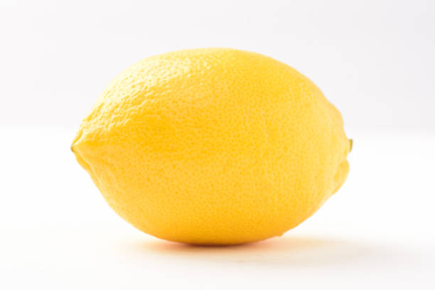 istock Fresh ripe yellow lemon fruit on white background 2173244241