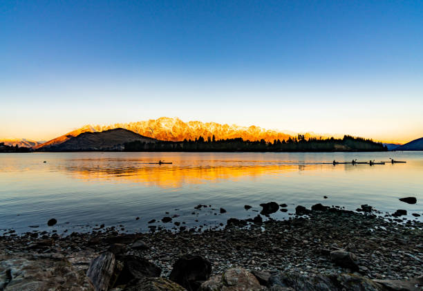 Queenstown garden is a perfect place if you want to witness amazing reflections of mountain in the lake during sunset