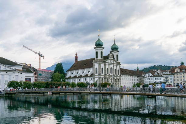 Lucerne, Switzerland - September 4, 2024: A picturesque city in central Switzerland known for its well-preserved medieval architecture and stunning setting by lake Lucerne and surrounded by mountains