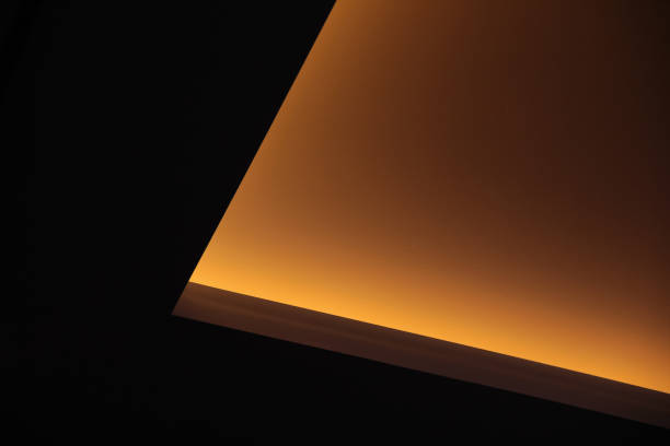 Home Interior - plaster ceiling with led lights in warm orange color