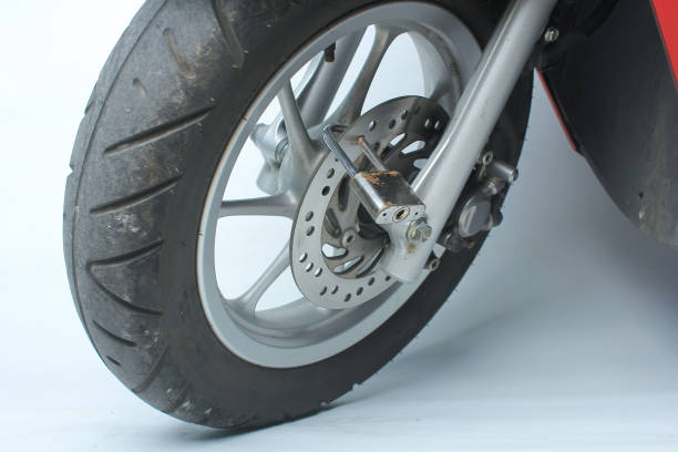 istock A padlock is attached to the motorcycle disc to imitixe theft. 2173269299