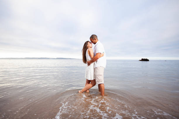 istock Couple having fun at the beach 2173271985