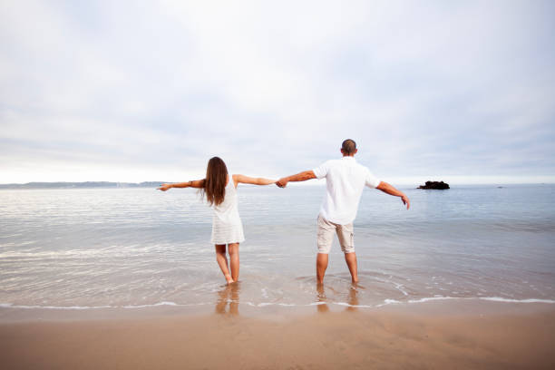 Couple walking at the beach