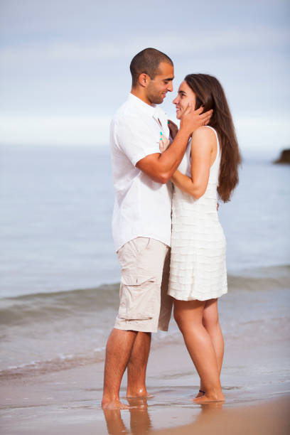 istock Couple having fun at the beach 2173272095