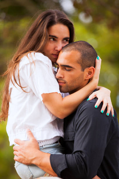 istock Couple having fun at the park 2173273223