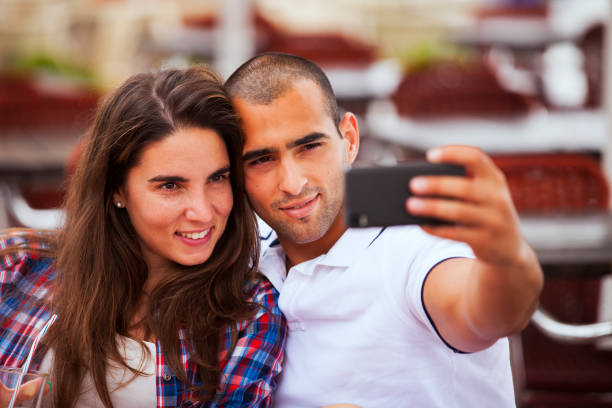 istock Couple having fun in a bar 2173275620