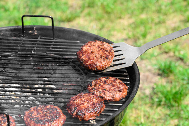 istock Beef, beef cutlets turned on the grill grate 2173276238