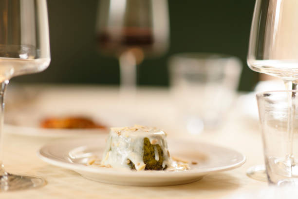 Close up on italian traditional northern food on a restaurant table. Many dishes are visible.