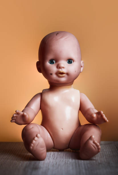 Old fashion, boy doll in a box tintype
