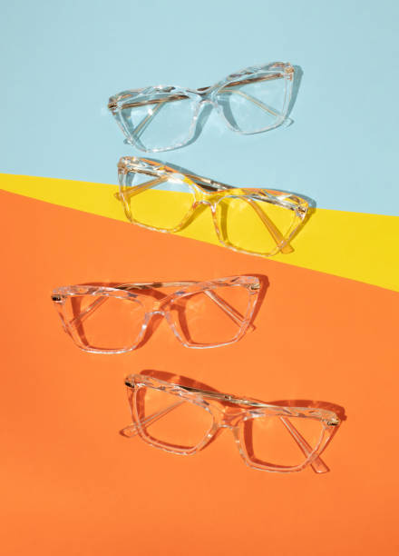 istock Transparent glasses on colorfull background. Minimal creative concept. Flat lay. 2173292072