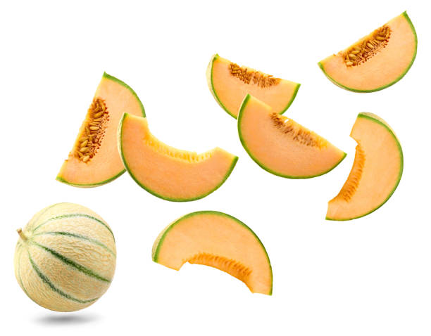 istock flying sliced cantaloupe melon isolated on white background. clipping path 2173292317