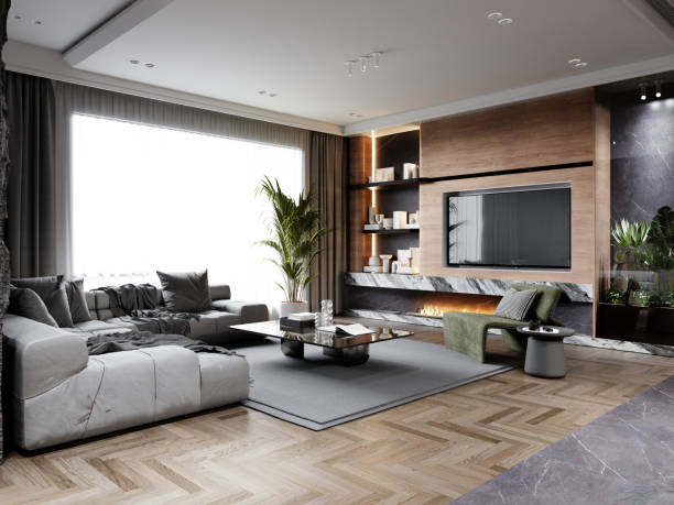 istock Modern living room with a minimalist design featuring a spacious gray sectional sofa, natural wood paneling, and a sleek marble fireplace, creating a warm and stylish ambiance 2173294546