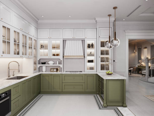 istock Charming kitchen with classic cabinetry, green lower cabinets, and white upper cabinets, accented with glass display shelves and marble countertops. Bright, elegant, and functional space. 2173294881