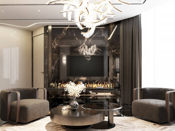 istock Modern lounge area with sleek armchairs, a round coffee table, and a black marble fireplace. Elegant lighting and dark tones create a luxurious, intimate atmosphere. 2173295155