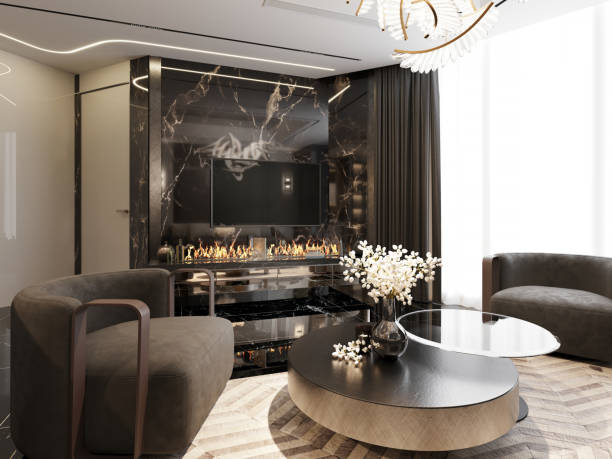 Modern lounge area with sleek armchairs, a round coffee table, and a black marble fireplace. Elegant lighting and dark tones create a luxurious, intimate atmosphere.