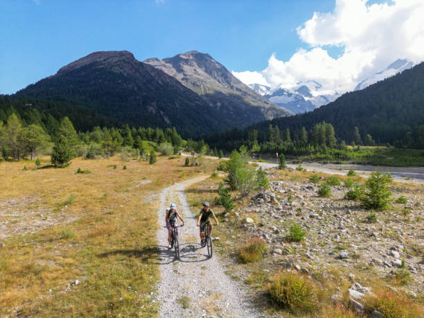 istock Bikers Exploring Mountain Trails Under Clear Skies 2173297725