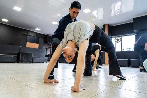 istock Young couple rehearsing in a dance studio 2173304477