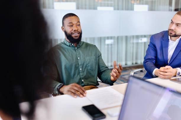 istock Businessman talking to his colleagues during a meeting 2173307094