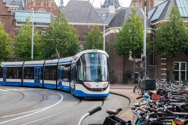 istock A tram, a public transport vehicle, in motion on rails. 2173313122
