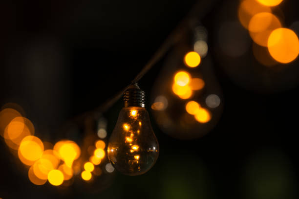 istock Gold Christmas Decorative Lighting with Bokeh on black background 2173315934
