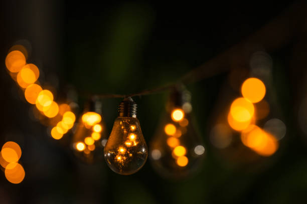 istock Gold Christmas Decorative Lighting with Bokeh on black background 2173315983