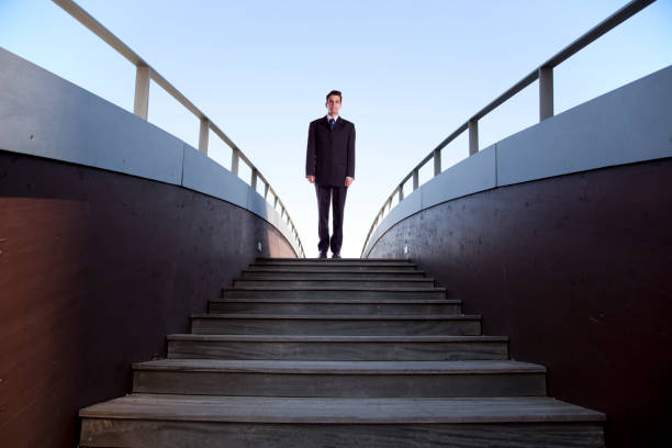 istock An entrepreneur strides with determination across a bridge, embodying confidence, leadership, and success 2173318754