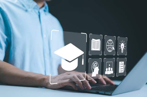 istock Online Education and E-Learning Concept. Person use laptop with icons representing online education, learning, knowledge sharing, educational tools, training, webinar on internet, digital courses, 2173322527