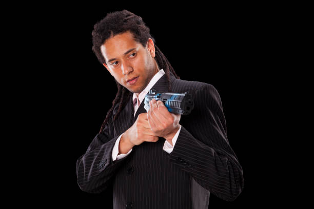 Powerful young man with a gun