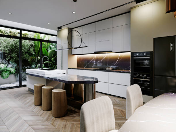 istock Sleek modern kitchen with a marble backsplash, minimalist cabinetry, and a central island with bar stools. Clean lines and contemporary design create a stylish, functional space. 2173327387