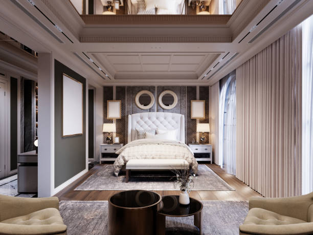 istock Elegant bedroom with a tufted headboard, quilted bedding, dual round mirrors, soft lighting, and floor-to-ceiling drapes creating a luxurious and inviting atmosphere. 2173327478