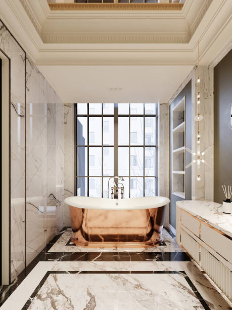 istock Elegant bathroom with a luxurious copper bathtub, marble flooring, and intricate ceiling details. Large windows flood the space with natural light. 2173329838