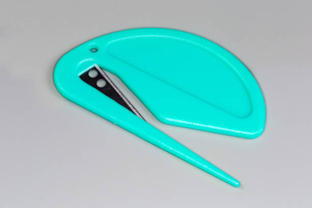 istock Safety plastic letter opener on a gray background 2173335431
