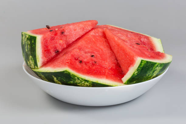 istock Pieces of the watermelon on dish on gray background 2173342449